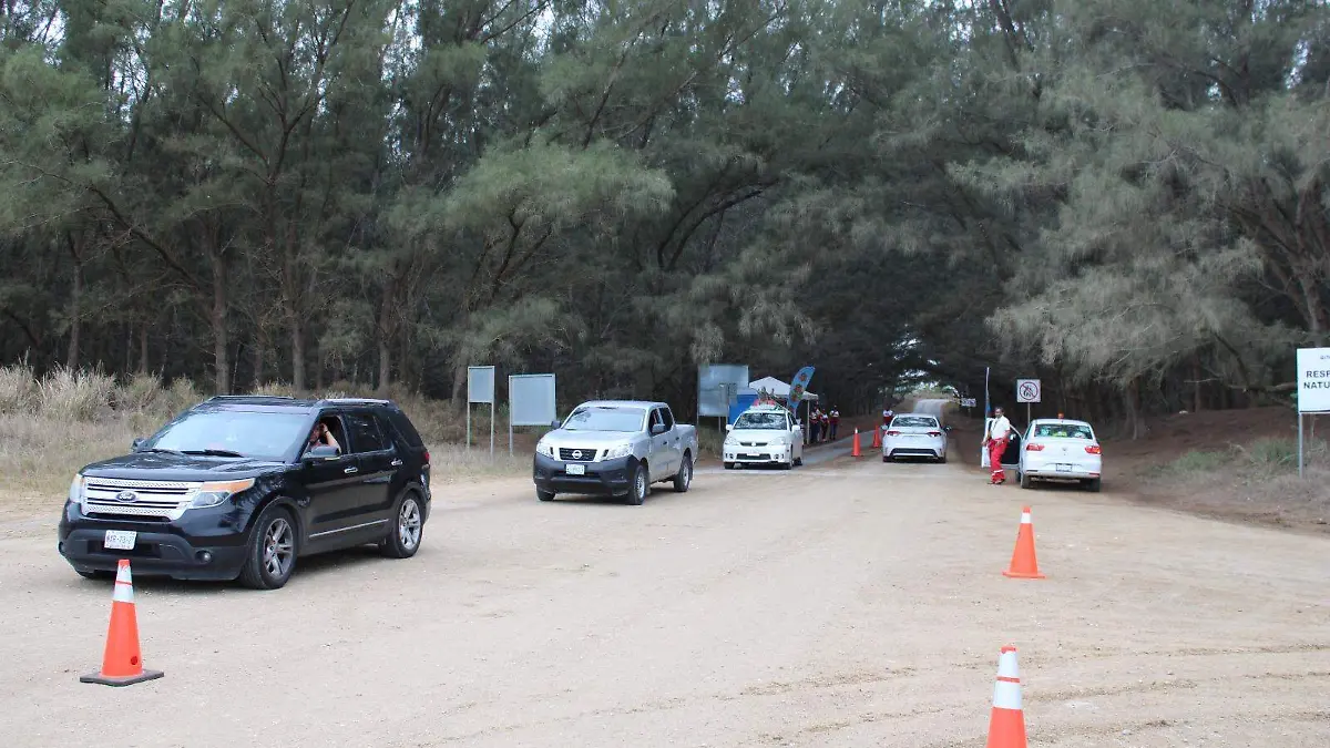 Acceso de autos a la zona de playa : Miguel Diaz